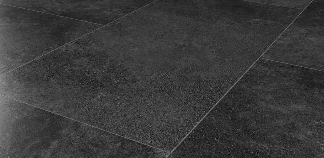 pavimento in SPC con finitura pietra lavarosa